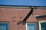 Sierlijke schaduw van de hijsbalk.
<br/>
Annemarieke Verheij, 2016-08-17
